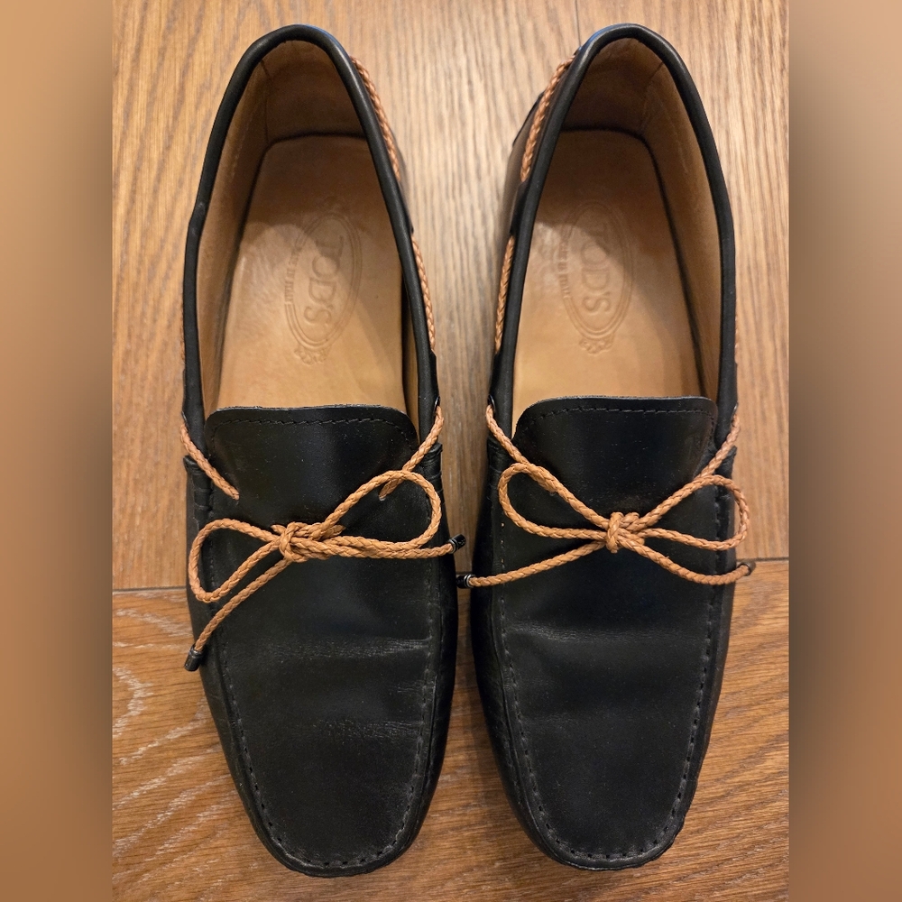 Tod's Black Leather Loafers with Tan Laces.